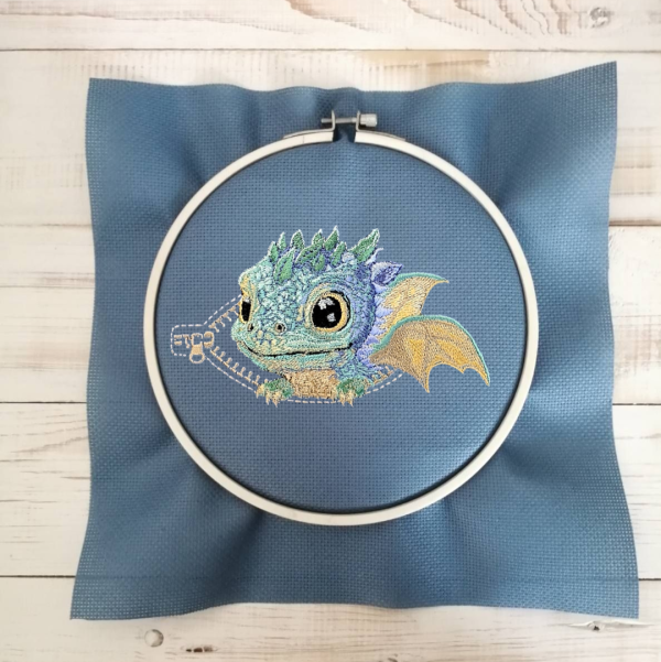 Dragon in a pocket machine embroidery design