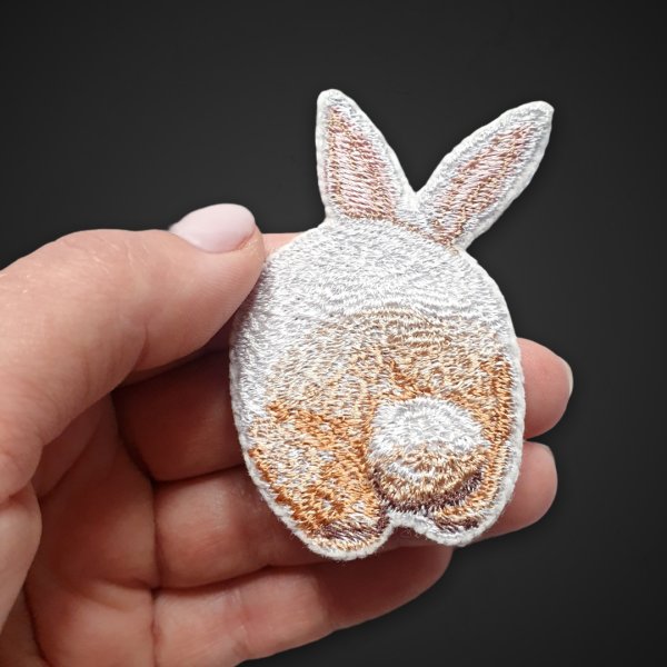 Miniature realistic design of a brooch, keychain, or patch «Rabbit booty»