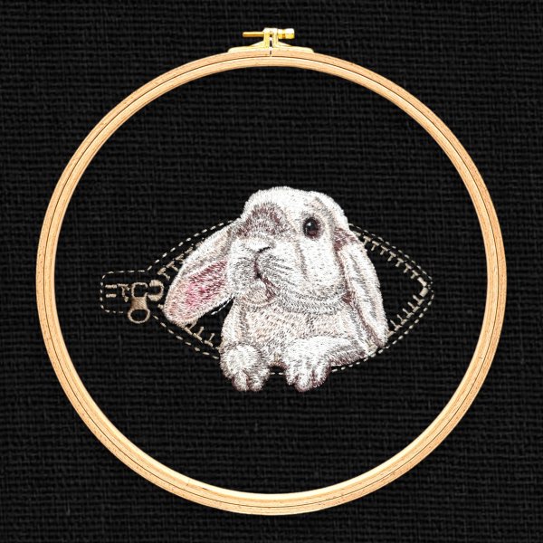 Rabbit in a pocket with a zipper Miniature realistic machine embroidery design