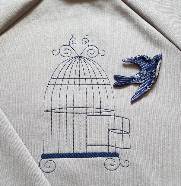 Machine embroidery design Brooch Swallow flying out of a cage