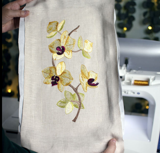 Orchid machine embroidery design using artistic satin stitch technique