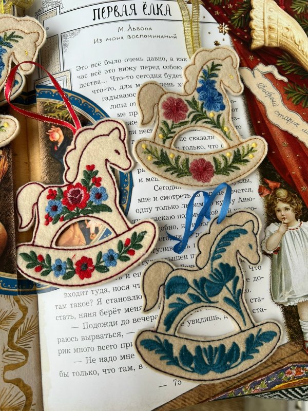 A set of three New Year's rocking horse designs for Christmas tree ornaments