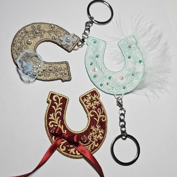 Machine embroidery horseshoe pendant for creating Christmas tree ornaments and other decor.