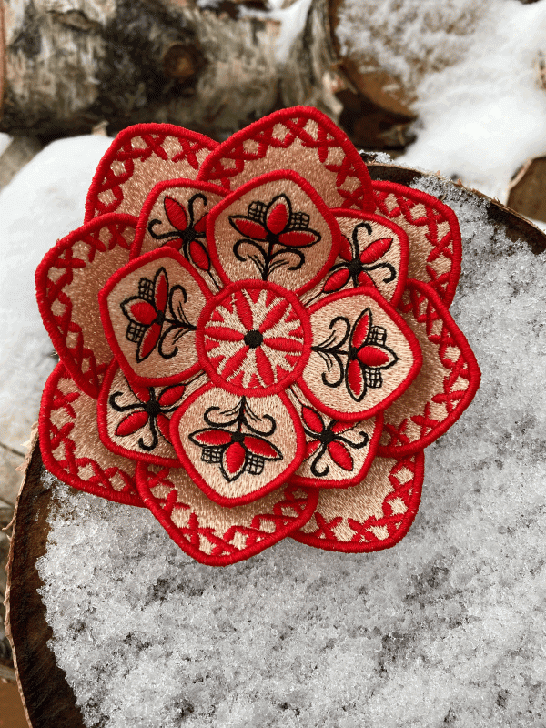 Fantasy flower brooch by FSL in the Mezen painting style, machine embroidery design