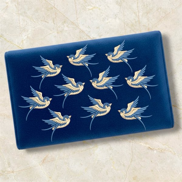 Swallow design for creating a clutch directly in the hoop or for embroidering on other items